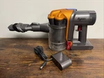 Dyson DC34 Multi Floor Cordless Bagless Vacuum Cleaner W/ Chargers Works Great!. Fixed Price $49.99.