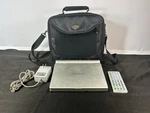 Portable Dvd Player W/ Remote, Charger & Targus Case Liquid Video LIDM-830. Fixed Price $19.99.