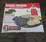 George Foreman GRP106WP 2 Removable Nonstick Heart-shaped Waffle Plates, Black. Fixed Price $11.99.