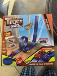 Ontel MTM-MC4/2 Magic Tracks Mega Xtreme With Race Car And 18FT Of Flexible. Fixed Price $35.00.