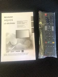 Sharp Aquos LC-32LE450U Remote Control With Manual. Fixed Price $15.00.